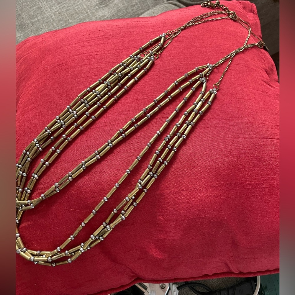 Chico’s layered bronze bead and faux diamond necklace
NEW